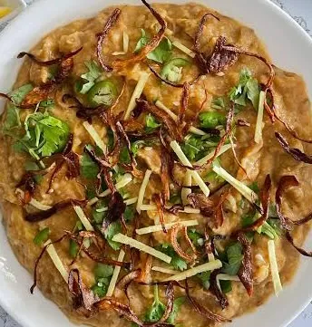 Fresh karahi being prepared at Butt Karahi & Biryani